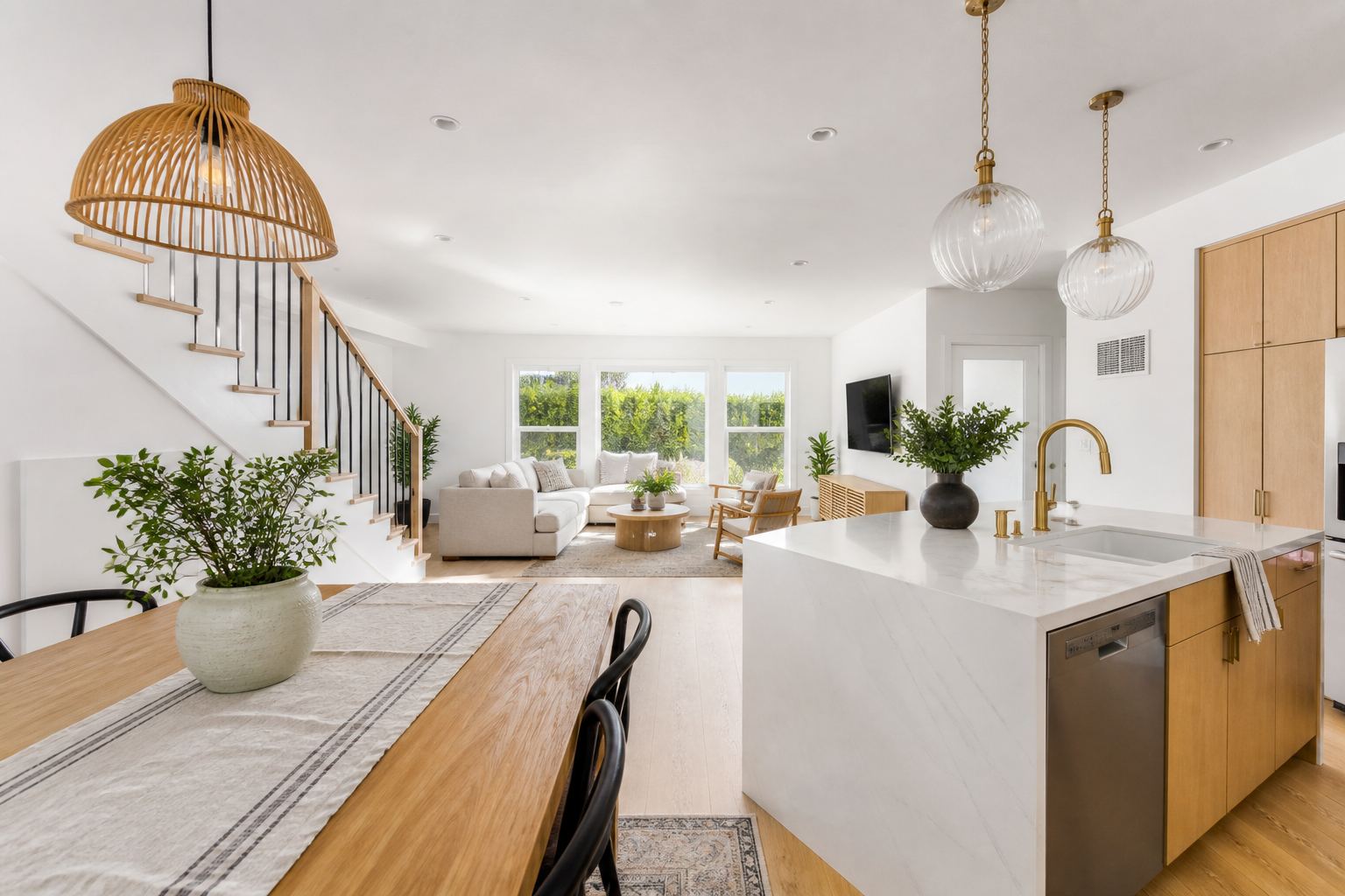 Open-plan kitchen and living room, shown before and after color grading